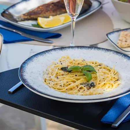 酒店 K, Boutique 科梅诺